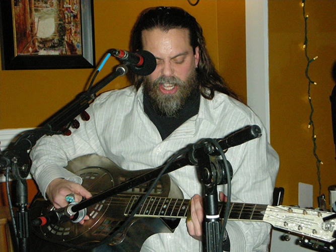 Blue Ajay performing solo with Trixie